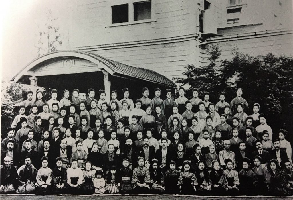 1904, Meiji Jogakkō’s students and staff posing in front of Sugamo Dormitory. 